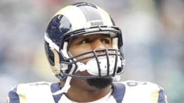 Dec 29, 2013; Seattle, WA, USA; St. Louis Rams defensive end Robert Quinn (94) walks on the field prior to the game against the Seattle Seahawks at CenturyLink Field. Mandatory Credit: Joe Nicholson-USA TODAY Sports