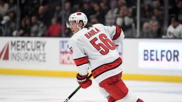 LOS ANGELES, CALIFORNIA - OCTOBER 15: Erik Haula #56 of the Carolina Hurricanes turns toward the play during a 2-0 Hurricanes win over the Los Angeles Kings at Staples Center on October 15, 2019 in Los Angeles, California. (Photo by Harry How/Getty Images)