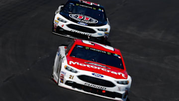 FORT WORTH, TX - APRIL 09: Ryan Blaney, driver of the #21 Motorcraft/Quick Lane Tire & Auto Center Ford, leads Kevin Harvick, driver of the #4 Jimmy John's Ford, during the Monster Energy NASCAR Cup Series O'Reilly Auto Parts 500 at Texas Motor Speedway on April 9, 2017 in Fort Worth, Texas. (Photo by Sean Gardner/Getty Images)
