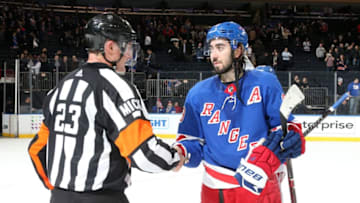 NEW YORK, NY - JANUARY 15: Referee Brad Watson shakes hands with Mika Zibanejad #93 of the New York Rangers after working his final game at Madison Square Garden following the game against the Carolina Hurricanes on January 15, 2019 in New York City. The New York Rangers won 6-2. (Photo by Jared Silber/NHLI via Getty Images)