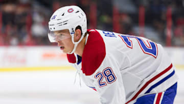 OTTAWA, ON - SEPTEMBER 21: Montreal Canadiens defenseman Mike Reilly (28) prepares for a face-off during first period National Hockey League preseason action between the Montreal Canadiens and Ottawa Senators on September 21, 2019, at Canadian Tire Centre in Ottawa, ON, Canada. (Photo by Richard A. Whittaker/Icon Sportswire via Getty Images)