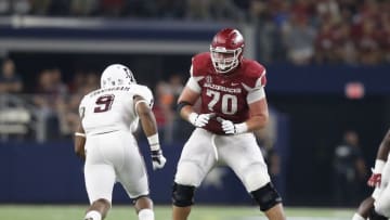 Sep 26, 2015; Arlington, TX, USA; Arkansas Razorbacks tackle Dan Skipper (70) in action against the Texas A&M Aggies at AT&T Stadium. Mandatory Credit: Matthew Emmons-USA TODAY Sports