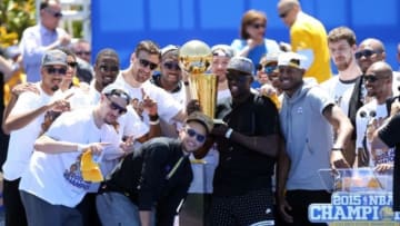 Jun 19, 2015; Oakland, CA, USA; Golden State Warriors hold the trophy during the Golden State Warriors 2015 championship celebration at the Henry J. Kaiser Convention Center. Mandatory Credit: Kelley L Cox-USA TODAY Sports