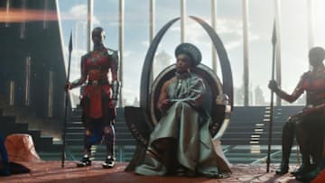 (L-R): Dorothy Steel as Merchant Tribe Elder, Florence Kasumba as Ayo, Angela Bassett as Ramonda, Danai Gurira as Okoye in Marvel Studios' Black Panther: Wakanda Forever. Photo courtesy of Marvel Studios. © 2022 MARVEL.