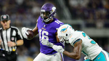 MINNEAPOLIS, MN - AUGUST 31: A.J. Hendy #37 of the Miami Dolphins pushes Cayleb Jones #16 of the Minnesota Vikings out of bounds in the preseason game on August 31, 2017 at U.S. Bank Stadium in Minneapolis, Minnesota. The Dolphins defeated the Vikings 30-9. (Photo by Hannah Foslien/Getty Images)