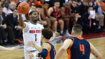 COLUMBUS, OH - DECEMBER 15: Luther Muhammad #1 of the Ohio State Buckeyes dishes off a pass as Walter Ellis #2 of the Bucknell Bisons defends in the second half on December 15, 2018 at Value City Arena in Columbus, Ohio. Ohio State defeated Bucknell 73-71. (Photo by Jamie Sabau/Getty Images)