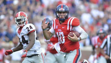 Sep 24, 2016; Oxford, MS, USA; Mississippi Rebels quarterback Chad Kelly (10) runs the ball during a play that would result in a touchdown during the third quarter of the game against the Georgia Bulldogs at Vaught-Hemingway Stadium. Mississippi won 45-14. Mandatory Credit: Matt Bush-USA TODAY Sports