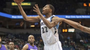 Jan 1, 2015; Minneapolis, MN, USA; Minnesota Timberwolves guard Andrew Wiggins (22) gets fouled in the fourth quarter against the Sacramento Kings at Target Center. Sacramento Kings win 110-107. Mandatory Credit: Brad Rempel-USA TODAY Sports