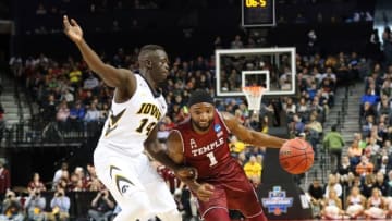 Mar 18, 2016; Brooklyn, NY, USA; Temple Owls guard Josh Brown (1) drives to the basket against Iowa Hawkeyes guard Peter Jok (14) in the first half in the first round of the 2016 NCAA Tournament at Barclays Center. Mandatory Credit: Anthony Gruppuso-USA TODAY Sports