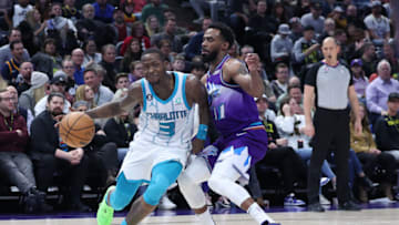 Jan 23, 2023; Salt Lake City, Utah, USA; Charlotte Hornets guard Terry Rozier (3) drives to the basket against Utah Jazz guard Mike Conley (11) in the second half at Vivint Arena. Mandatory Credit: Rob Gray-USA TODAY Sports