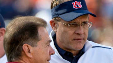 Alabama head coach Nick Saban chats with Auburn head coach Gus Malzahn during warm ups before the Iron Bowl at Jordan-Hare Stadium in Auburn, Ala., on Saturday, November 30, 2019.Pre1240