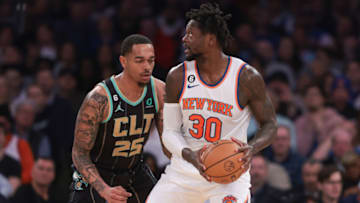 Mar 7, 2023; New York, New York, USA; New York Knicks forward Julius Randle (30) looks to pass against Charlotte Hornets forward P.J. Washington (25) during the first quarter at Madison Square Garden. Mandatory Credit: Vincent Carchietta-USA TODAY Sports