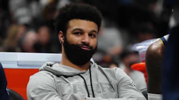 Denver Nuggets guard Jamal Murray (27) on the bench in the second quarter against the Sacramento Kings at Ball Arena on 7 Jan. 2022. (Ron Chenoy-USA TODAY Sports)