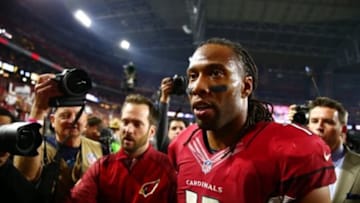 Jan 16, 2016; Glendale, AZ, USA; Arizona Cardinals wide receiver Larry Fitzgerald (11) reacts as he leaves the field after defeating the Green Bay Packers in a NFC Divisional round playoff game at University of Phoenix Stadium. Mandatory Credit: Mark J. Rebilas-USA TODAY Sports