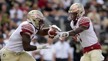 WINSTON SALEM, NC - SEPTEMBER 30: James Blackman #1 of the Florida State Seminoles hands the ball off against hte Wake Forest Demon Deacons during their game at BB&T Field on September 30, 2017 in Winston Salem, North Carolina. (Photo by Streeter Lecka/Getty Images)