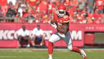 Oct 26, 2014; Kansas City, MO, USA; Kansas City Chiefs running back Jamaal Charles (25) catches a pass and runs for yardage during the first half against the St. Louis Rams at Arrowhead Stadium. Mandatory Credit: Denny Medley-USA TODAY Sports