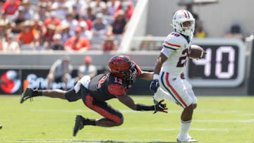 SAN DIEGO, CA - SEPTEMBER 3: Rayshon Luke #20 of the Arizona Wildcats runs with the ball against Dallas Branch #12 of the San Diego State Aztecs on September 3, 2022 at Snapdragon Stadium in San Diego, California. (Photo by Tom Hauck/Getty Images)