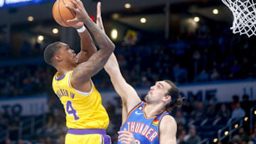 Lonnie Walker IV #4 of the Los Angeles Lakers shoots over Dario Saric #9 of the Oklahoma City Thunder (Photo by Ian Maule/Getty Images)