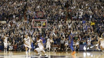 Dec 2, 2013; Storrs, CT, USA; Connecticut Huskies guard Shabazz Napier (13) reacts after scoring the winning basket against the Florida Gators in the second half at Harry A. Gampel Pavilion. UConn defeated Florida Gators 65-64. Mandatory Credit: David Butler II-USA TODAY Sports