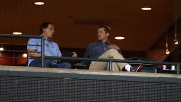 Jul 7, 2014; Phoenix, AZ, USA; Arizona Diamondbacks chief baseball officer Tony LaRussa (left) with San Francisco 49ers head coach Jim Harbaugh in the fifth inning against the Miami Marlins at Chase Field. Mandatory Credit: Mark J. Rebilas-USA TODAY Sports
