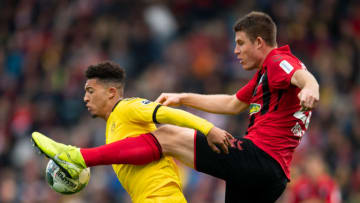 FREIBURG IM BREISGAU, GERMANY - OCTOBER 05: Jadon Sancho of Dortmund (L) in action with Dominique Heintz of Freiburg during the Bundesliga match between Sport-Club Freiburg and Borussia Dortmund at Schwarzwald-Stadion on October 5, 2019 in Freiburg im Breisgau, Germany. (Photo by Daniel Kopatsch/Bongarts/Getty Images)