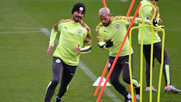 Manchester City's German midfielder Ilkay Gundogan (L) leads Manchester City's Argentinian striker Sergio Aguero (R) during a team training session at City Football Academy in Manchester, north west England on October 21, 2019, on the eve of their UEFA Champions League football Group C match against Atalanta. (Photo by Paul ELLIS / AFP) (Photo by PAUL ELLIS/AFP via Getty Images)