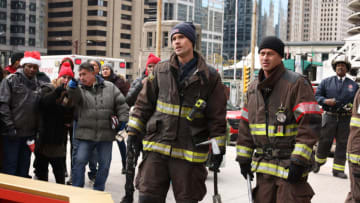 "Winterfest" Episode 1009 -- Pictured: (l-r) Brett Dalton at Jason Pelham, Taylor Kinney as Kelly Severide -- (Photo by: Adrian S. Burrows Sr./NBC)