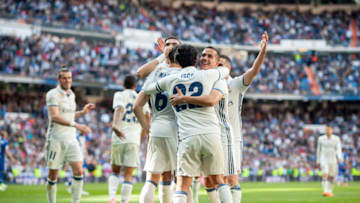 MADRID, SPAIN - APRIL 02: Nacho of Real Madrid celebrates with Isco Alarcon and Lucas Vazquez after scoring Real's 3rd goal during the La Liga match between Real Madrid CF and Deportivo Alaves on April 2, 2017 in Madrid, Spain. (Photo by Denis Doyle/Getty Images)