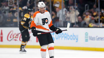 BOSTON, MASSACHUSETTS - SEPTEMBER 30: Morgan Frost #48 of the Philadelphia Flyers reacts after Jake DeBrusk #74 of the Boston Bruins scored a goal during the second period of the preseason game at TD Garden on September 30, 2021 in Boston, Massachusetts. (Photo by Maddie Meyer/Getty Images)