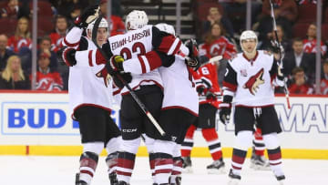 Oct 25, 2016; Newark, NJ, USA; The Arizona Coyotes celebrate a goal by Coyotes defenseman Oliver Ekman-Larsson (23) against the New Jersey Devils during the third period at Prudential Center. The Devils defeated the Coyotes 5-3. Mandatory Credit: Ed Mulholland-USA TODAY Sports