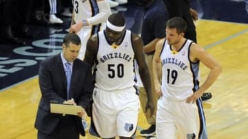 May 1, 2014; Memphis, TN, USA; Memphis Grizzlies head coach David Joerger talks with forward Zach Randolph (50) and guard Beno Udrih (19) during the game against the Oklahoma City Thunder in game six of the first round of the 2014 NBA Playoffs at FedExForum. Oklahoma City Thunder beat the Memphis Grizzlies 104 - 84. Mandatory Credit: Justin Ford-USA TODAY Sports