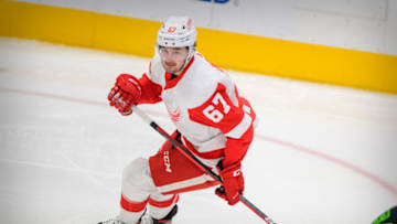 Jan 28, 2021; Dallas, Texas, USA; Detroit Red Wings left wing Taro Hirose (67) in action during the game between the Dallas Stars and the Detroit Red Wings at the American Airlines Center. Mandatory Credit: Jerome Miron-USA TODAY Sports