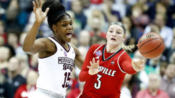 COLUMBUS, OH - MARCH 30: Sam Fuehring #3 of the Louisville Cardinals is defended by Teaira McCowan #15 of the Mississippi State Lady Bulldogs during the first half in the semifinals of the 2018 NCAA Women's Final Four at Nationwide Arena on March 30, 2018 in Columbus, Ohio. (Photo by Andy Lyons/Getty Images)