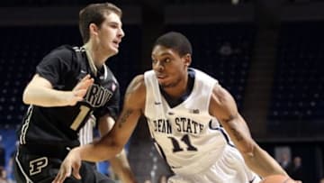 Feb 5, 2013; University Park, PA, USA; Penn State Nittany Lions guard Jermaine Marshall (11) drives the ball around Purdue Boilermakers guard Stephen Toyra (11) during the first half at the Bryce Jordan Center. Mandatory Credit: Matthew O