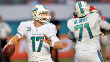 Sep 21, 2014; Miami Gardens, FL, USA; Miami Dolphins quarterback Ryan Tannehill (17) throws a pass against the Kansas City Chiefs during the second half at Sun Life Stadium. Chiefs won 34-15. Mandatory Credit: Steve Mitchell-USA TODAY Sports
