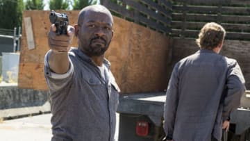 Lennie James as Morgan Jones, Jayson Warner Smith as Gavin - The Walking Dead _ Season 7, Episode 14 - Photo Credit: Gene Page/AMC