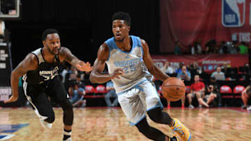 LAS VEGAS, NV - JULY 9: Malik Beasley #25 of the Denver Nuggets handles the ball against the Minnesota Timberwolves during the 2017 Las Vegas Summer League on July 9, 2017 at the Thomas & Mack Center in Las Vegas, Nevada. NOTE TO USER: User expressly acknowledges and agrees that, by downloading and/or using this Photograph, user is consenting to the terms and conditions of the Getty Images License Agreement. Mandatory Copyright Notice: Copyright 2017 NBAE (Photo by Garrett Ellwood/NBAE via Getty Images)