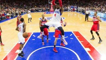 Feb 27, 2015; Philadelphia, PA, USA; Philadelphia 76ers center Nerlens Noel (4) dunks against the Washington Wizards during the second half at Wells Fargo Center. The 76ers defeated the Wizards 89-81. Mandatory Credit: Bill Streicher-USA TODAY Sports