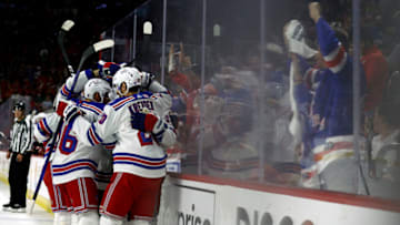 RALEIGH, NORTH CAROLINA - MAY 30: Chris Kreider #20 of the New York Rangers celebrates with his team following a first period goal in Game Seven of the Second Round of the 2022 Stanley Cup Playoffs against the Carolina Hurricanes at PNC Arena on May 30, 2022 in Raleigh, North Carolina. (Photo by Jared C. Tilton/Getty Images)