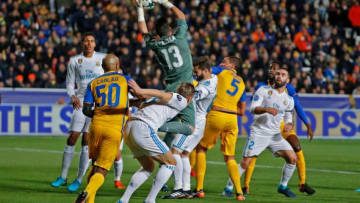 Real Madrid's Spanish goalkeeper Kiko Casilla (C) takes hold of the cross during the UEFA Champions League Group H match between Apoel FC and Real Madrid on November 21, 2017, in the Cypriot capital Nicosia's GSP Stadium. / AFP PHOTO / Jack GUEZ (Photo credit should read JACK GUEZ/AFP/Getty Images)