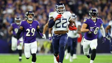 BALTIMORE, MARYLAND - JANUARY 11: Running back Derrick Henry #22 of the Tennessee Titans carries the ball against the Baltimore Ravens during the AFC Divisional Playoff game at M&T Bank Stadium on January 11, 2020 in Baltimore, Maryland. (Photo by Rob Carr/Getty Images)
