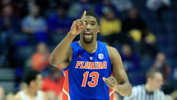 NASHVILLE, TENNESSEE - MARCH 15: Kevarrius Hayes #13 of the Florida Gators celebrates in the game against the LSU Tigers during the Quarterfinals of the SEC Basketball Tournament at Bridgestone Arena on March 15, 2019 in Nashville, Tennessee. (Photo by Andy Lyons/Getty Images)