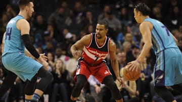 Feb 6, 2016; Charlotte, NC, USA; Washington Wizards guard Ramon Sessions (7) defends a pick and roll against Charlotte Hornets forward center Frank Kaminsky (44) and guard Jeremy Lin (7) during the first half at Time Warner Cable Arena. Mandatory Credit: Sam Sharpe-USA TODAY Sports