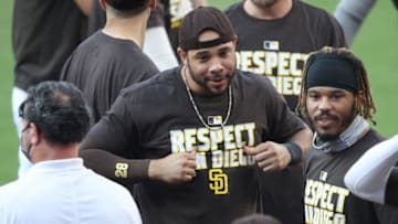 SAN DIEGO, CALIFORNIA - SEPTEMBER 20: Tommy Pham #28 of the San Diego Padres reacts with teammates after defeating the Seattle Mariners 7-4in a game to clinch a spot in the playoffs at PETCO Park on September 20, 2020 in San Diego, California. The game was moved to San Diego due to air quality concerns in Seattle from the wildfires. (Photo by Sean M. Haffey/Getty Images)