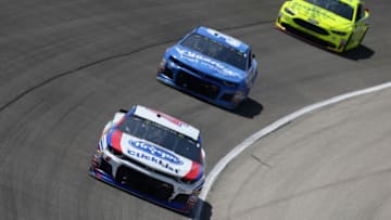 JOLIET, IL - JULY 01: AJ Allmendinger, driver of the #47 Kroger ClickList Chevrolet, leads Chris Buescher, driver of the #37 Kleenex Wet Wipes Chevrolet, and Paul Menard, driver of the #21 Menards/Sylvania Ford, during the Monster Energy NASCAR Cup Series Overton's 400 at Chicagoland Speedway on July 1, 2018 in Joliet, Illinois. (Photo by Matt Sullivan/Getty Images)