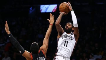 NEW YORK, NEW YORK - JANUARY 31: Kyrie Irving #11 of the Brooklyn Nets drives to the basket against Shaquille Harrison #3 of the Chicago Bulls at Barclays Center on January 31, 2020 in New York City.NOTE TO USER: User expressly acknowledges and agrees that, by downloading and or using this photograph, User is consenting to the terms and conditions of the Getty Images License Agreement. (Photo by Mike Stobe/Getty Images)
