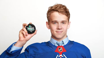 DALLAS, TX - JUNE 22: Nils Lundkvist poses after being selected twenty-eighth overall by the New York Rangers during the first round of the 2018 NHL Draft at American Airlines Center on June 22, 2018 in Dallas, Texas. (Photo by Tom Pennington/Getty Images)