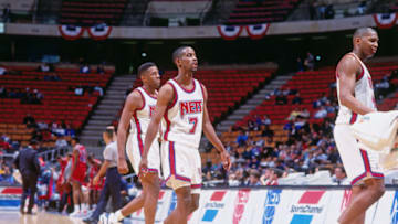 EAST RUTHERFORD, N.J. - 1993: Kenny Anderson #7 of the New Jersey Nets walks during a game played circa 1993 at the Brendan Byrne Arena in East Rutherford, New Jersey. NOTE TO USER: User expressly acknowledges and agrees that, by downloading and or using this photograph, User is consenting to the terms and conditions of the Getty Images License Agreement. Mandatory Copyright Notice: Copyright 1993 NBAE (Photo by Nathaniel S. Butler/NBAE via Getty Images)