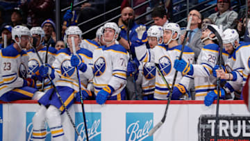 Dec 15, 2022; Denver, Colorado, USA; Former Colorado Avalanche player and current Buffalo Sabres center Tyson Jost (17) waves to the crowd during a moment of recognition during the first period at Ball Arena. Mandatory Credit: Isaiah J. Downing-USA TODAY Sports
