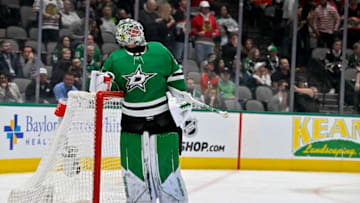 Feb 22, 2023; Dallas, Texas, USA; Dallas Stars goaltender Jake Oettinger (29) checks the replay screen after he gives put the game winning goal to Chicago Blackhawks center Max Domi (not pictured) during the third period at the American Airlines Center. Mandatory Credit: Jerome Miron-USA TODAY Sports